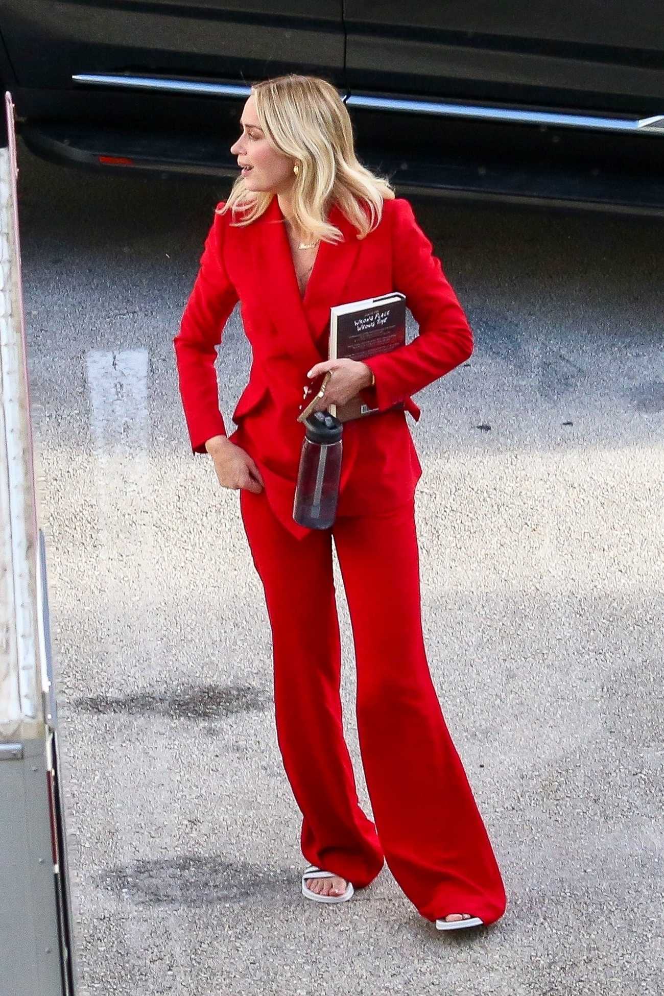 Emily_Blunt_-_Seen_on_the_set_of__The_Pain_Hustlers__filming_in_Miami2C_August_292C_202205.jpg